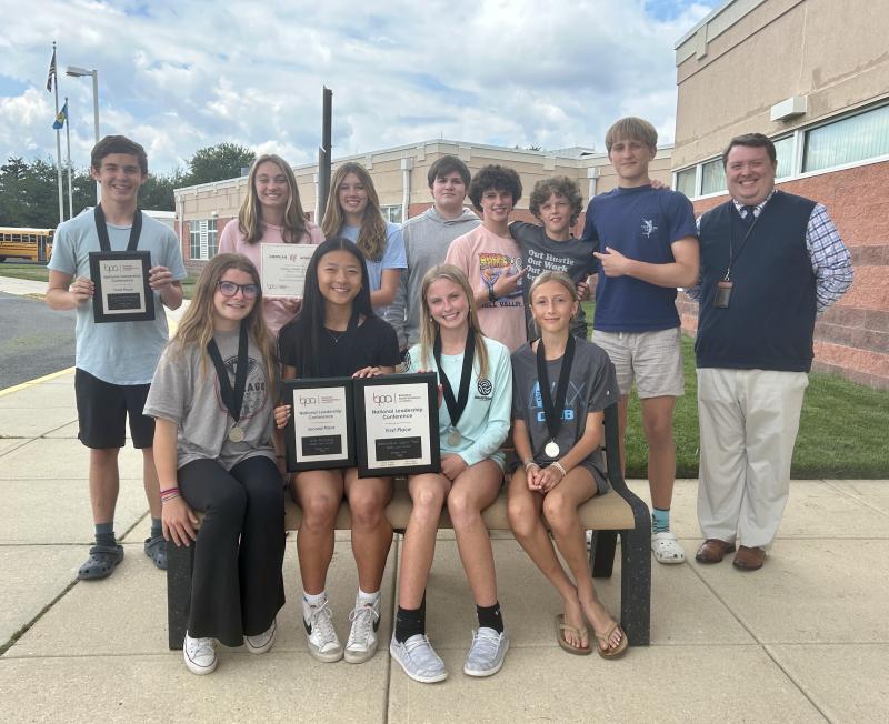Mariner Middle School’s Business Professionals of America team returned home from the 2024 BPA National Leadership Conference with a host of medals, including the Chapter Distinction Award. Gathered in back (l-r) are Isaac Stuart, Blair Chubb, Natalie Arseneau, Logan Copp, Quinn Kluchnik, Trizton Willey, Carson Tuer and advisor Daniel Shockley. In front are Daisy Hughes, Kate Dowd, Hannah Wells and Linley Draper. ELLEN DRISCOLL PHOTO